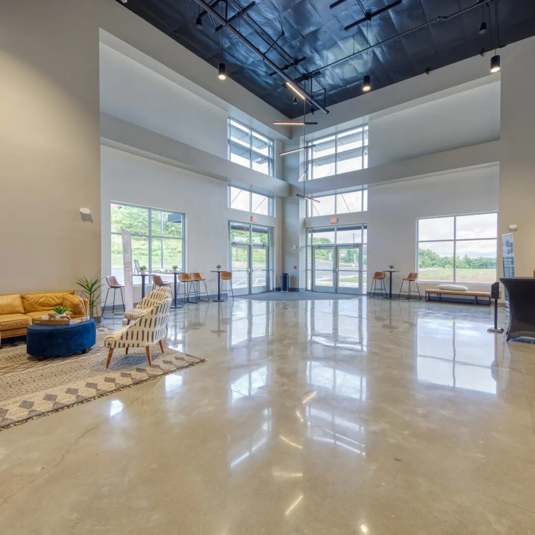 Expansive interior area with tiles and big windows and doors in Rockford, TN